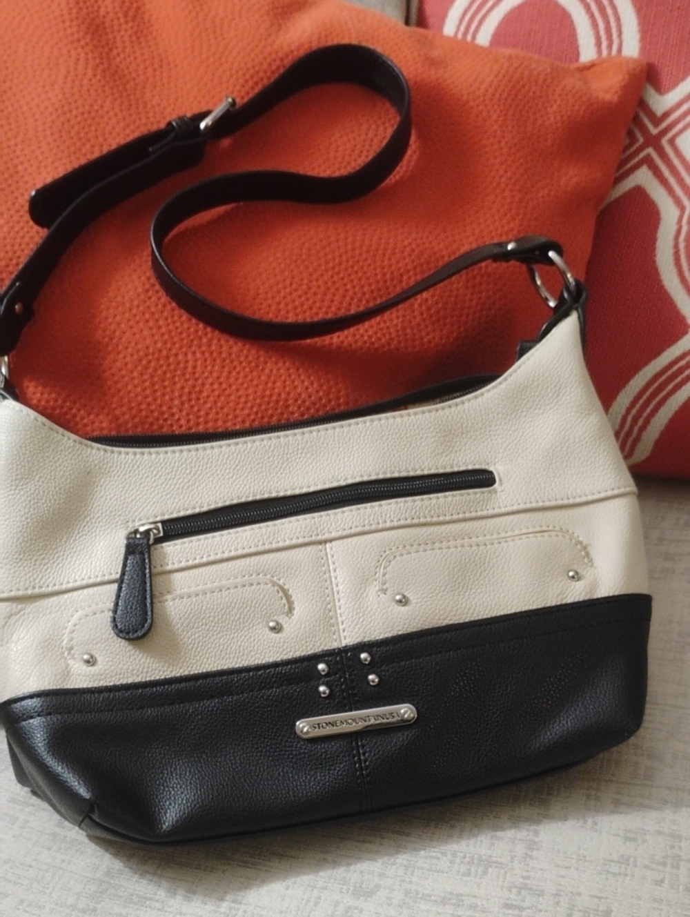 Stone Mountain Black And Creme Pebbled Leather Crossbody Bag